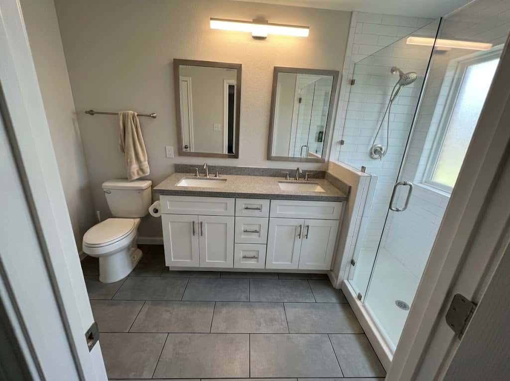 Full bathroom remodel with tiled shower and double vanity, Austin TX