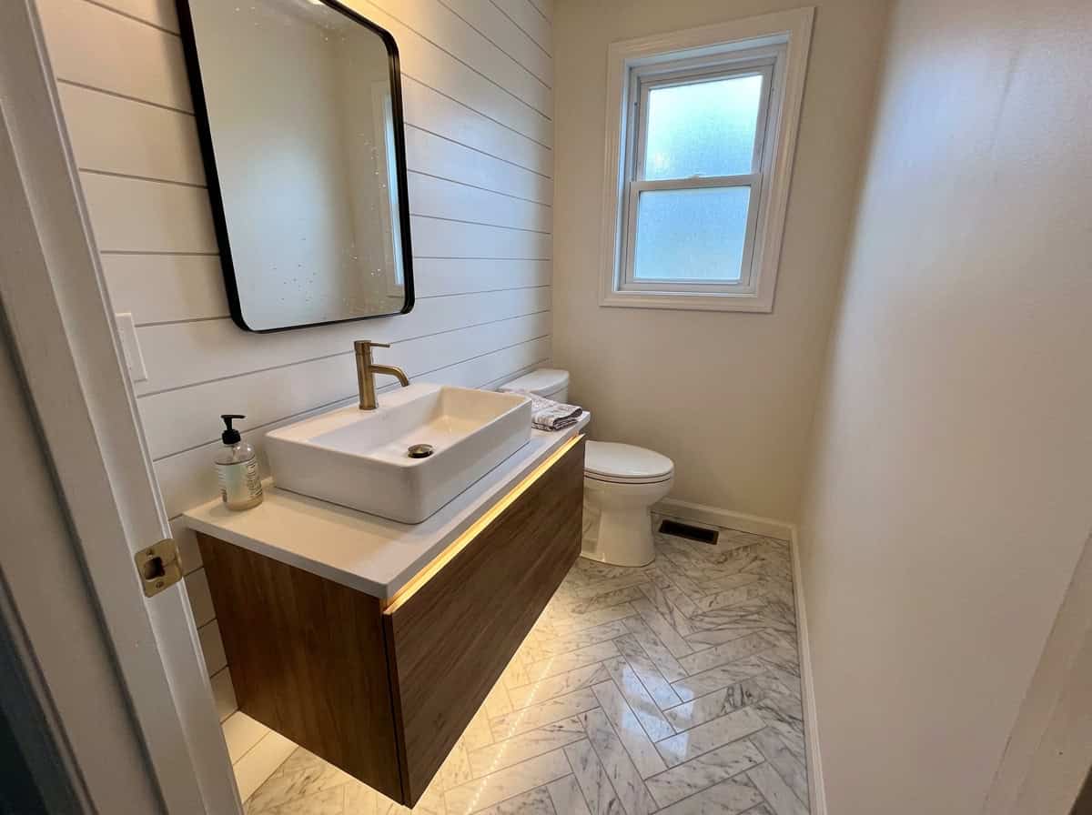 Narrow bathroom remodel with vessel sink and shiplap accent wall, Austin TX