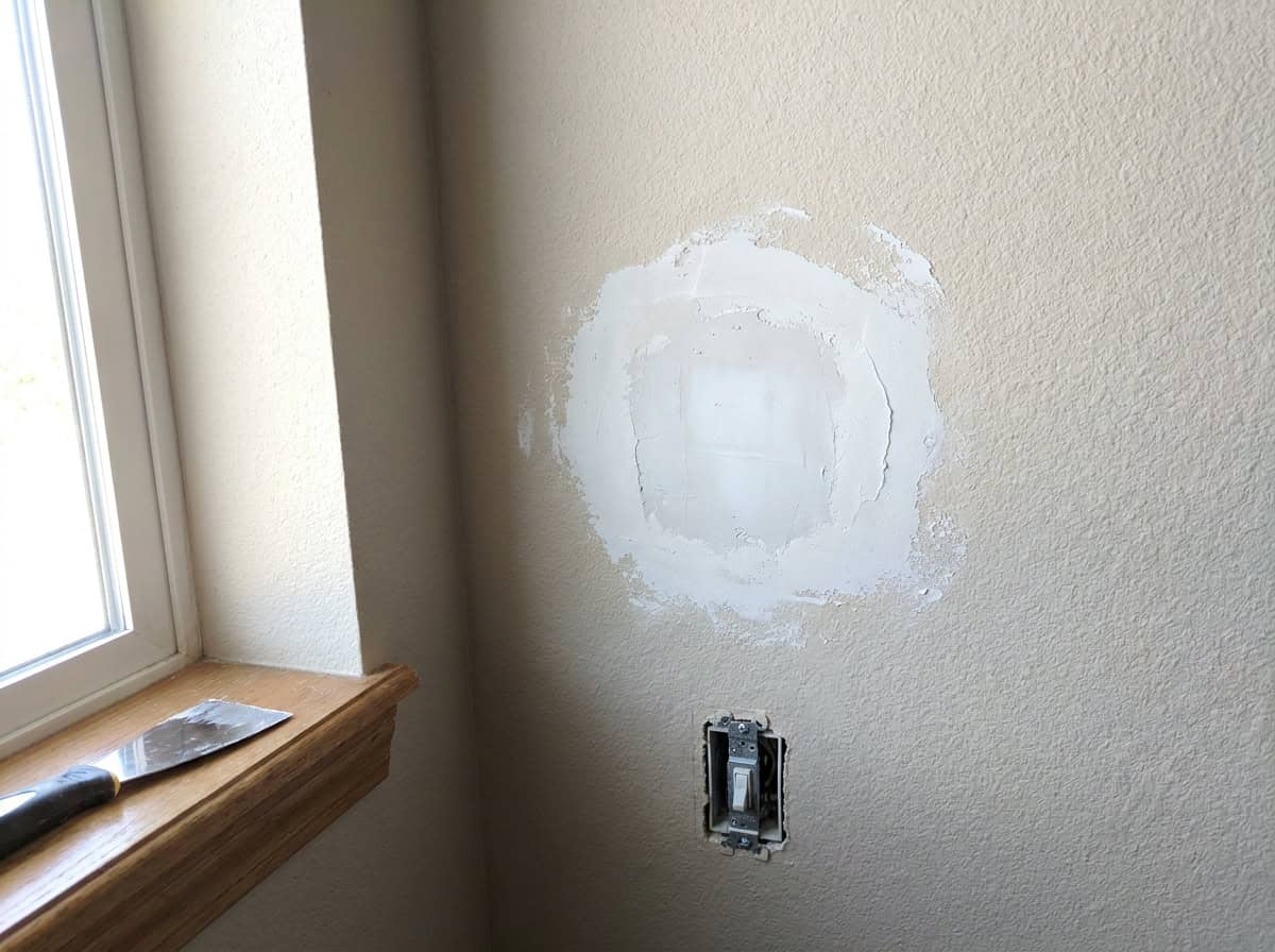 Drywall patch repair primed and ready to paint, Austin TX