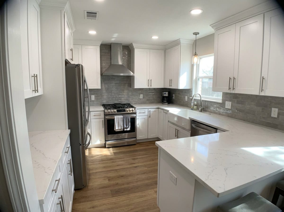 Kitchen remodel with white shaker cabinets and quartz countertops, Austin TX